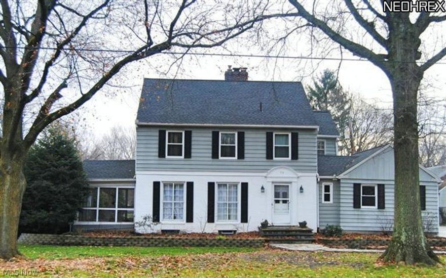 Move right into this recently updated colonial on 2 lots. Owner has done nothing but add value to this home since purchasing it 5 years ago. Updates include opening up the kitchen to flow into the dining room with granite counters, hardwood floors, travertine tile, KraftMaid cabinets and stainless appliances. Master bath and half bath have also been completely updated. Recently waterproofed and replaced 2 basement walls, refaced updated electrical and plumbing, blown in insulation, new windows, new roof and more. Updated landscaping all around the home including a beautiful exterior patio of about 1,100 SF with bar.