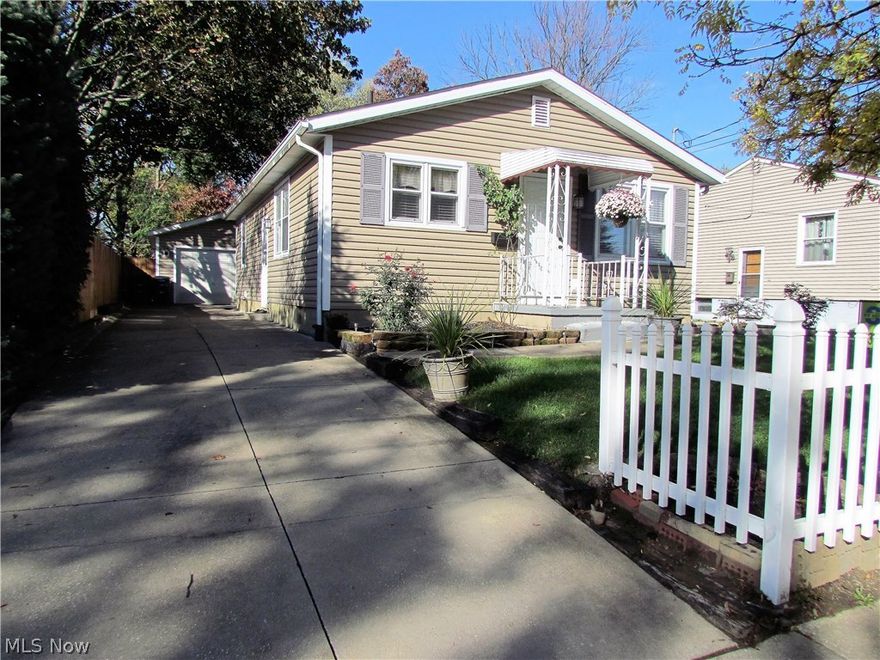 This gorgeous Ranch style home is a must see! It offers so much privacy, featuring a newer driveway and a convenient garage with attached Sun Room. The Sun room makes this setting so peaceful and inviting. Private yard is well landscaped and fully fenced in, making it very private and secure. The front of the home features large paver stone flower beds and front porch is surrounded by gorgeous seasonal flowers. This home will take your breath away!Brand new 14 inch thick laminate flooring is throughout this entire home. Sellers keep every corner of the house extremely clean and well organized. You will love neutral colors, built in TV, gorgeous window treatments and 3 spacious bedrooms. Master bedroom has a nice organizational system in the closet. Full bathroom features new ceramic tile flooring, new vanity with glass vessel sink, chrome faucet, nice lighting and a ultra quiet and energy efficient toilet. Kitchen is spacious, offering expensive stainless steel appliance package, level