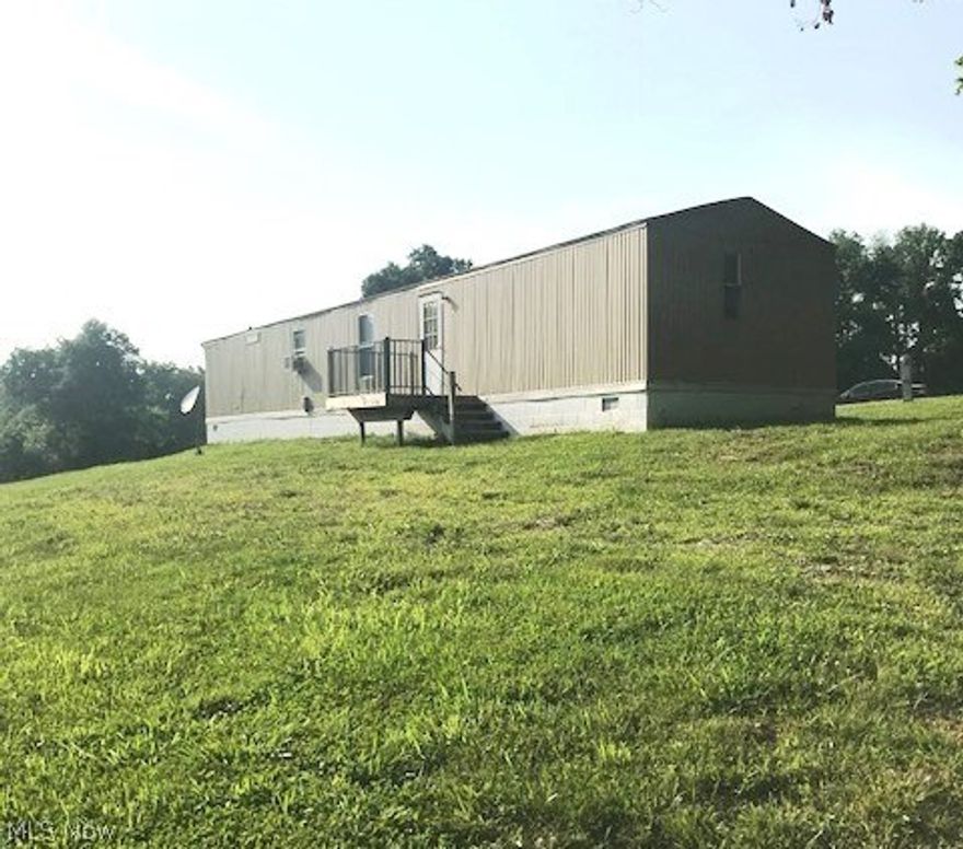 Call now to view this move-in ready home located on a gorgeous country setting with plenty of elbow room. The master suite features a walk-in closet and a garden tub. The rooms are bright and cheery with a breakfast bar separating the living room and eat-in kitchen. The property is also set up with three RV park lots, each equipped with full hook-up, individual meters, water and sewage. This makes for a nice little side business for new owner with an entrepreneurial spirit.