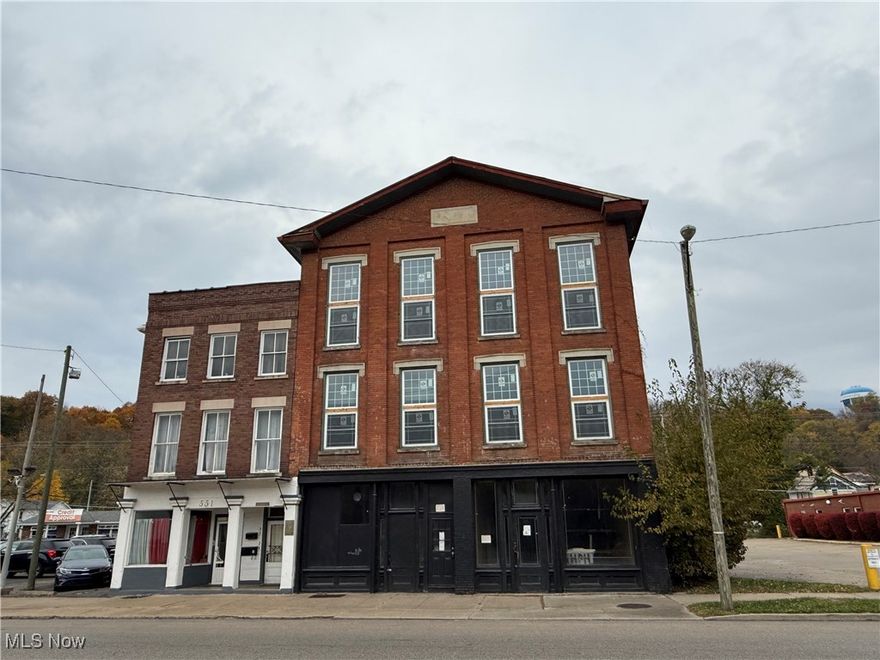 Own a beautiful building in Historical Putnam District. This building has been gutted about 95 percent and is ready to be built into 2 1000 soft apartments and 1 2000 sqft apartment or 4 1000 sqft apartments on the 2nd and 3rd floor and 2 commercial spaces on the 1st floor. There is also a 1 story section in the back of the property that could be converted into 2 efficiency apartments or storage units for the tenants. There is a full basement under the 3 story section of the building with a concrete floor. All 2nd and 3rd floor windows have been replaced in the past year. New single roof installed in 2022 on the one story section.