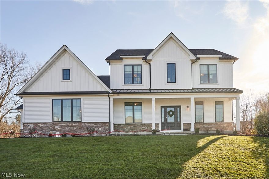 Gorgeous & spacious new build modern farmhouse in the beautiful Pine Hill neighborhood in North Royalton!! This is "THE" HBA Home for the Holidays Home, and now this can be Your home! Enjoy all the luxuries a new build has to offer, including its spacious, open kitchen with granite countertops, Bosch appliances and tiled backsplash. This high-energy-efficient home has 4 bedrooms (owner's suite on first floor); 3.5 baths; and a main floor laundry for ease of living. Relax in the light-filled great room with cozy fireplace with wood mantle and shiplap detail.  Enjoy details like the recessed lighting, double owners suite vanities, custom glass-door shower, engineered hardwood floors, and Moen finishes. This truly is hassle free living in style for your familly! Schedule a private showing and visit today.