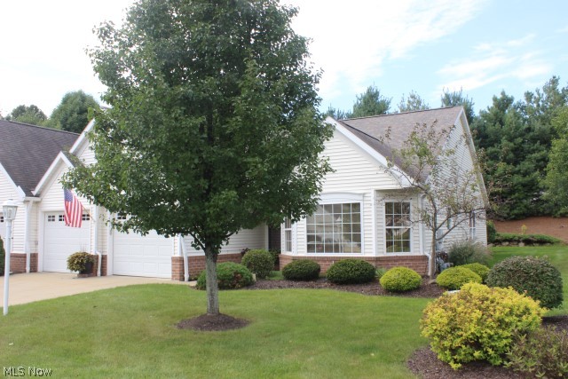 Absolute move in ranch condo with 2 bedroom, 2 bath, 1654SF, beautifully maintained & pretty neutral décor* Wonderful location on cul de sac* Foyer entry with ceramic floor & built in display cabinet* Great room with gas log fireplace with built in entertainment center & atrium doors to pretty & private patio/back yard* Formal dining area* Eat in kitchen with oak cabinets, roll out drawers, ceramic back splash, pantry, fully applianced including Bosch dishwasher with extended warranty, microwave, refrig, range, disposal & updated kitchen floor* Den* 1st floor laundry with laundry tub, shelves, cabinets & including washer (2 yrs old with warranty) & dryer* Master bedroom with spacious walk in closet* Master bath with double vanity, shower, jetted tub & heat lamp* 2 car insulated attached garage with storage room* 92% eff Carrier furnace* Humidifier* Aprilaire media air cleaner* Water softener* Electric approx 79/mo.* Gas approx. 67/mo.* A pleasure to show*