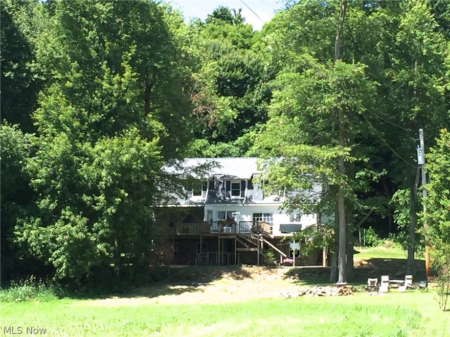 This home sits back off the road down a long blacktop drive and has a lot to offer the growing family with over 2900 sq feet of living space and 3 to 5 possible bedrooms.  This two story home has a Large deck to extend your space to the outdoors, a full walk out basement and two car detached garage that all sits on 2.33 acres!  There is an area that could be finished out to be a full In-Law Suite for a totally separate Living Area from the rest of the home.   Bring your ideas, bring your family, create your dream.  Put on all the finishing touches and make this the home it should be.