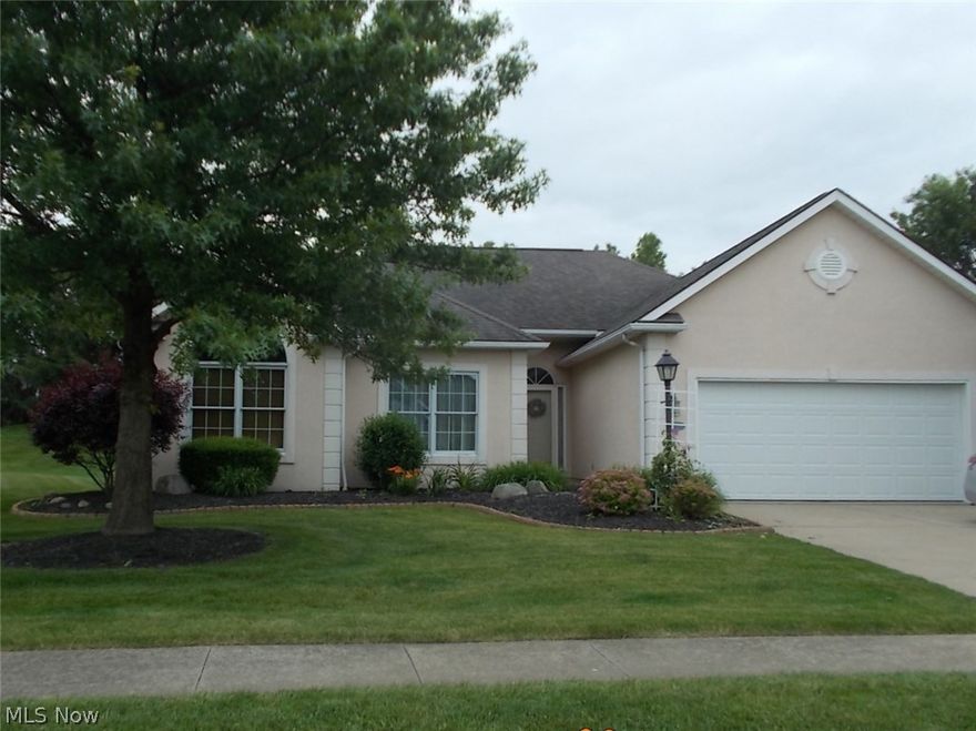 Carefree living in the North-end community of Deer Creek. Beautiful hard wood floors throughout the main living area. Large living room with gas fireplace. Open kitchen with eat in dining area. Lower level features a huge media room, an additional den. Game room, Rec room, also great workshop.  A Must see-more than meets the eye from the outside. Convenient location, close to shopping yet tucked in a peaceful setting.