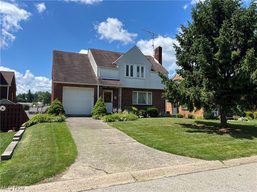 1 1/2 story 3 bedroom brick home.  Half bath on main level.  Full ceramic bathroom up stairs,  Full basement with rec room.  Two bedrooms have walk-in closets  Immediate possession.