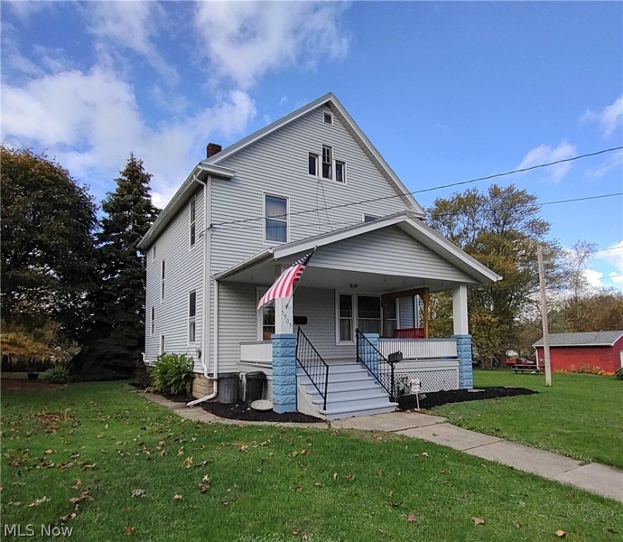 Grand old colonial on a quiet dead end street. Many of the original charm remains in this home. Very large living spaces down and above average size bedrooms up. All bedrooms have large closets. Lots of natural woodwork throughout the home. There is a walk up attic for storage as well. Beautiful large open front porch with a classic porch swing. This property backs up to Clifford Kaden community park with easy access. There is no drive way on the property but the owners have utilized the right of way for West 59th (city paper street - not in actual existence) as parking for more than 50 years. High efficiency furnace and central A/C less than 1 year old. This is an extremely well cared for solid home in a very affordable price range!