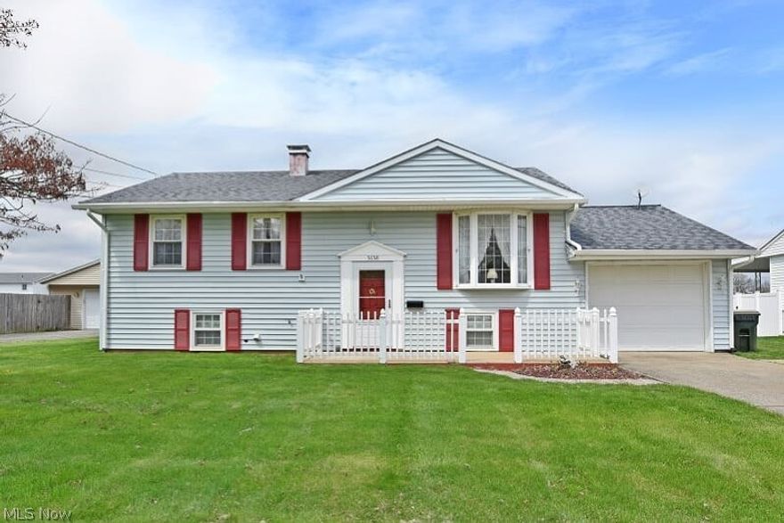 A Lovely Bi-level home located in the College Park development.  This home has a wonderful living room with a large picture window and newer carpet. It has a nice sized kitchen with a dining area that has a sliding glass door which leads to large enclosed sunroom.  There are 3 bedrooms and a full bath located on the main level.  The lower level has a large family room with a fireplace, another full bathroom and entrance to the attached one car garage.  Also, you will find another room on the lower level that could be used as an office or an additional bedroom.  A separate laundry area is located on the lower level as well. Enjoy your days outside in large back yard or a quiet evening sitting on the front porch.   With your added touch, this house could become your home.