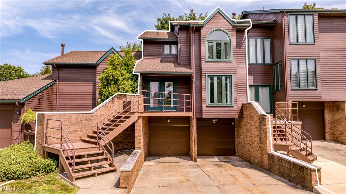 Discover the largest townhome in Woodhawk, offering over 2,600 sq ft, featuring 3 bedroom AND 3.5 baths, low-maintenance living across three finished levels—each with its own private covered outdoor space with serene wooded views in the back.
Step inside to soaring vaulted ceilings throughout the home, enhanced by skylights that bathe the space in natural light, creating an open, airy atmosphere from room to room. The main living area flows effortlessly into the dining room and eat-in kitchen, featuring stainless steel appliances, ample cabinetry, and a breakfast bar.
The spacious primary suite is a true sanctuary, offering a spa-inspired en-suite bath with a soaking tub, walk-in shower, generous walk-in closet, and direct access to a private deck overlooking peaceful woods—an ideal spot to start or end your day.
Enjoy three levels of indoor-outdoor living, including a charming front porch, two private balconies, and a terrace-style walkout patio from the finished lower level—perfect for a guest suite, home gym, or cozy media room. A dedicated laundry area and 2-car attached garage (2 garage doors) with a wide drive adding daily convenience and function.
Outside your door, indulge in resort-style amenities: two swimming pools, tennis and racquetball courts, a clubhouse with party room and fitness center, playground, and 24-hour gated security.
Located in desirable Mayfield Heights, you’ll appreciate top-rated schools, close proximity to I-271, shopping, restaurants and quick access to Hillcrest Hospital, a premier Cleveland Clinic facility.
This townhome offers a rare combination of size, style, and serenity perfect for families, professionals, or downsizers seeking a truly turnkey lifestyle. New roof and skylights 2023, new furnace 2024. Schedule your private tour today.