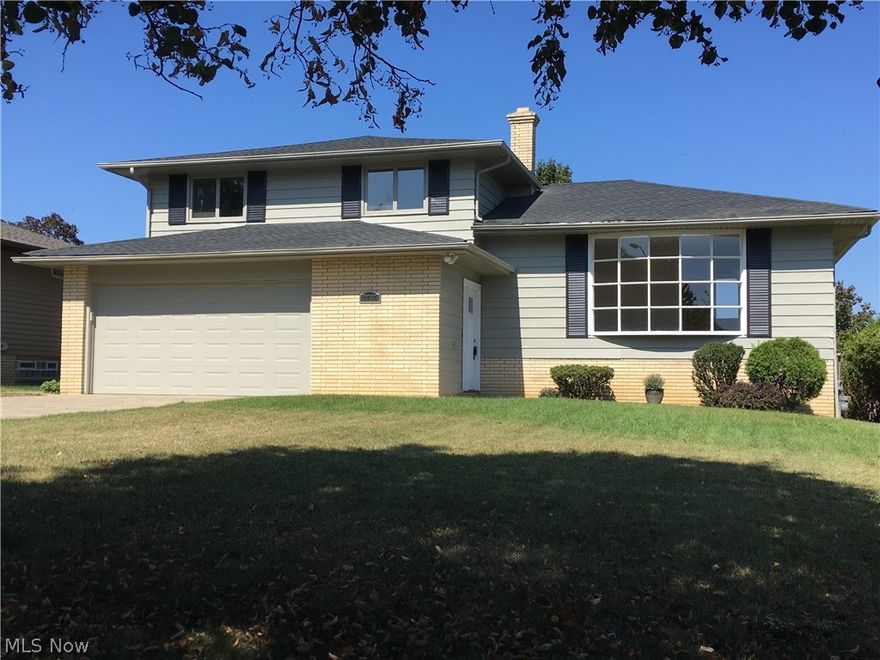 Stunning Split Level Freshly updated thru out!! Possible fourth bedroom in lower level, which has brand new carpeting, closet, and recess lighting. Foyer features slate flooring up to Living/ Dining room and kitchen has pristine brand new wide plank vinyl flooring. Exquisite kitchen features granite counter tops, stainless steel appliances, GFI/phone charger ports & subway back splash. Steps to Family room which opens to beautiful back yard with covered patio, great for entertaining! Original hardwood floors upstairs and both bathrooms updated. New roof, new furnace, A/C unit & hot water tank, electric panel. All appliances stay. Tree lined Cul De Sac street!