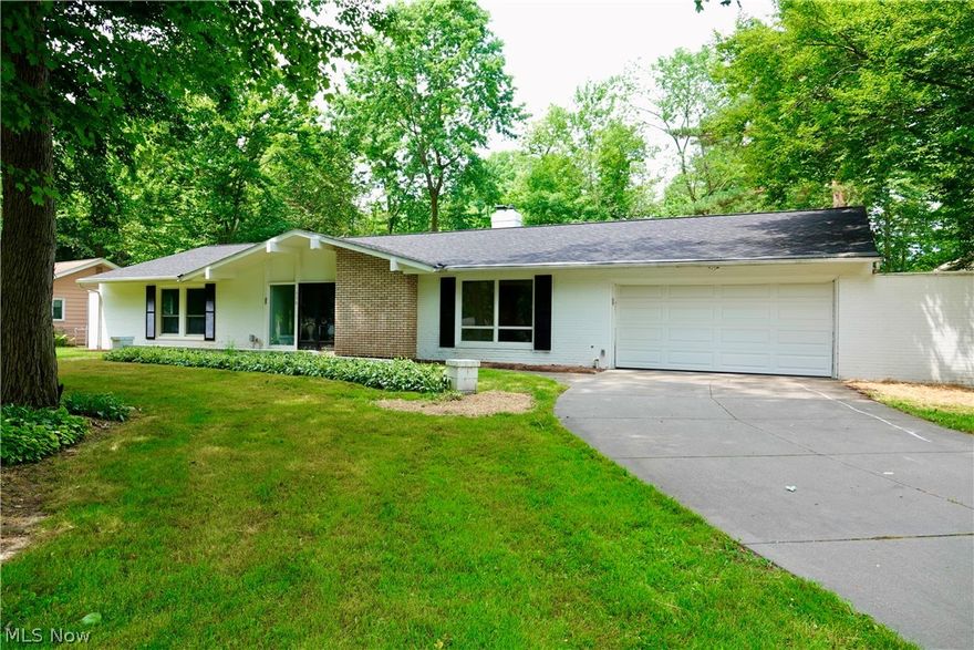 Welcome to ranch style living in beautiful Mayfield Village! This home features 2000+ sqft, 3 beds, 2.5 baths, 2 car garage, and a fireplace! New roof (2024), professionally painted (2024), updated recessed lighting (2024), new flooring (2024), updated master bath 92024). Some vinyl windows (2022), central air (2022), 100 amp service (2020). Enclosed porch with sliding door (2022). New hot water tank (2022). This one won't last! Show and sell!