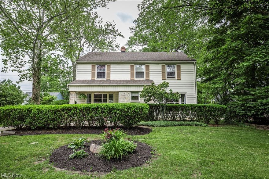 Tucked back on a deep 1/3 acre lot in the coveted Van Sweringen neighborhood of Shaker Heights sits this sprawling colonial ready for its new owners. Natural light bounces across the original hardwood floor from the oversized windows throughout the open mid-century center hall layout. The spacious foyer spills into both living room and formal dining, wraps through a newly refreshed eat in kitchen and back into the study just off the living room with privacy pocket doors. There's also a remodeled half bathroom at the back of the home on the first floor, perfect for company while you host on one of four patio spaces! Head upstairs where you will find four spacious bedrooms, including a charming en-suite and the second full bathroom. If all of this isn't enough home, lower level is partially finished and features new glass block windows, fresh paint and full sized ceilings. The most surprising feature here is without a doubt the BRAND NEW, NEVER USED - two car garage, complete with electr