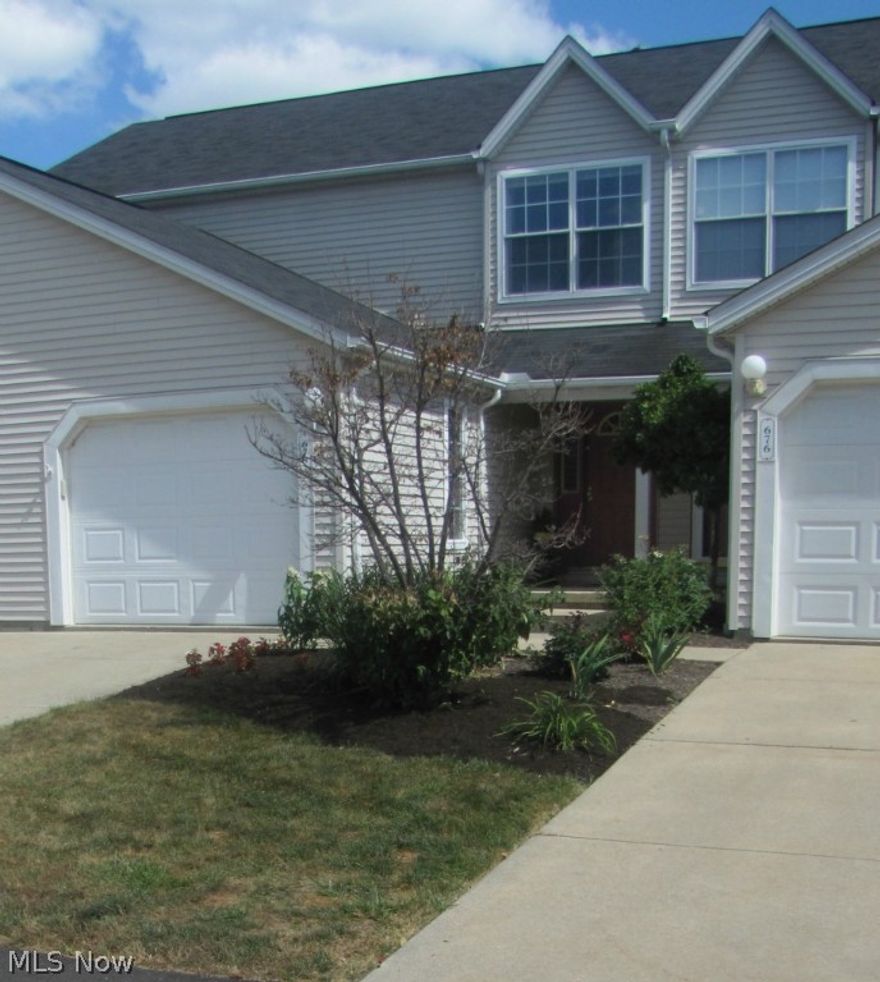 Move-In Ready 2 Bedroom 2.5 Bath condo in Hickory Ridge with finished walk-out lower level. Freshly updated Townhouse with new carpet and paint throughout (August 2015)! Enter from the re-landscaped front walk and porch and you look through to the sunny back deck. There is a coat closet and half bath off the foyer. The Great Room has a Dining Area and opens through glass sliders to the Deck. The open Kitchen has newer appliances (dishwasher, stove, microwave and refrigerator) & beautiful white cabinets and looks out to the back views. Upstairs is the Master Bedroom with vaulted ceiling and large double closet and the Full Bath. The large second Bedroom also has double closets. Note the additional square footage in the  beautifully finished lower level. It has a large bright Family Room with built-in bookshelves and glass sliders to the patio. You will enjoy the Full Bath as well as a laundry room with washer & dryer included and storage area. There is an attached 1 car Garage with stor