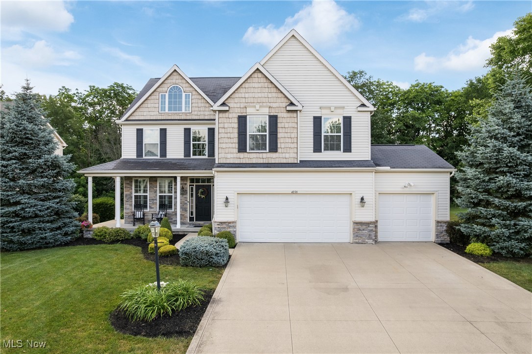 Tucked away in Cobblestone Park, this incredibly well kept 4 bedroom, 2 full / 2 half bath, 3 car garage colonial has all the amenities that you are looking for in a dream home. 9-foot ceilings greet you as you walk through the first floor with all hardwood flooring but cozy carpet in the family room. The dining room has ample space and a tray ceiling. Step into the kitchen and enjoy an open floorplan that overlooks the family room with stone fireplace and morning room that can seat large gatherings. All high end stainless steel appliances will convey. The kitchen has a large walk-in pantry, granite counter tops, island and windows throughout for great natural lighting. Separated and private, the first floor office is perfect for a work from home owner or additional play room. Step outside to enjoy a patio with a built in firepit and comfortable pergola seating area. Located in one of the most desirable streets in the development, the back treeline and housing separation give you privacy while still being in a neighborhood. Hard to find 3 large auxiliary bedrooms are located on the second floor. The 21x14 master offers one large 10x7 walk-in closet and master bath with a river rock shower (work done by Architectural Justice). Lower level is professionally finished with a family room with Nature Stone flooring (2021), kitchen area, rec room, half bath, and gym. Furnace and air replaced in 2022. Being in Montville Twp, you can enjoy no city tax. This home is tucked away from downtown Medina yet still close enough. Come see why this development has become one of the most popular places to live in Medina.
