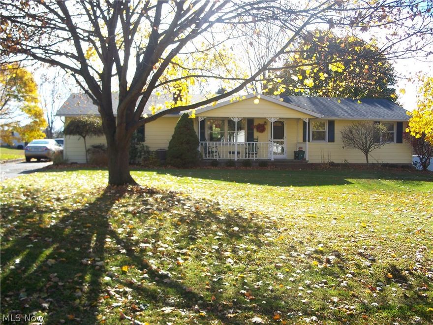 Fantastic location with easy access to Akron, Canton, Barberton, or Massillon.  Picturesque half acre lot.  This spacious ranch features over 1600 square feet of living area without the sunroom.  First floor amenities include three bedrooms, living room, eat in kitchen, family room, and laundry.  Lower level is finished with recreation room, fourth bedroom, and shower.  Save money with average gas and electric bills around $80.  Updates in 2014 include new roof shingles $8,000, new septic system $8400, furnace & CAC $5,000.  All there is left to do is to decorate to your taste.