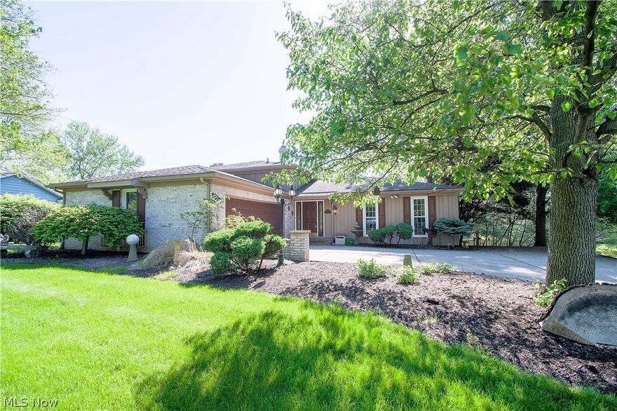 Beautiful family home in the desirable Pembroke neighborhood in Plain Township (Plain Local Schools.) Enter the lovely foyer with double closets & crown molding, and You'll love the open floor plan and unexpected space in this home. The family room with new laminate floors is to the right, followed by the formal dining room. The updated eat-in kitchen offers granite overlaid countertops and Jenn Air top-of-the-line floating black glass appliances, tiles backsplash, and a dinette area. Enjoy the step-down fabulous great room with a cozy fireplace, a built-in media center, and a wet bar with a drink chiller and wine storage and opens to a charming four-seasons room with an abundance of natural light. A walkout from the four-season room to a fantastic multi-level deck with a pergola & a firepit is perfect for entertaining & enjoy the beautiful backyard. The upper level features a full bath and three bedrooms, including the master bedroom with a master bath (walk-in shower). A two-car gara