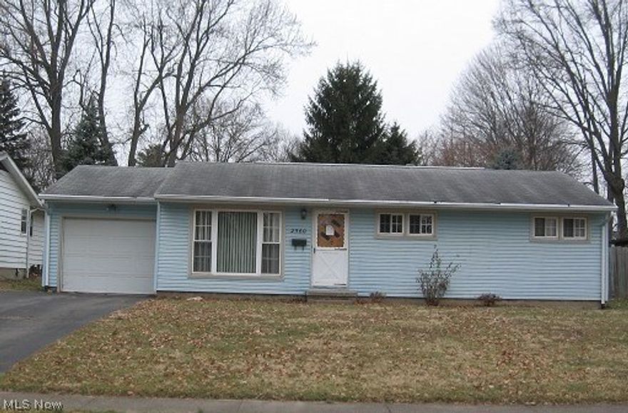 Ranch home with 3 bedrooms, 2 baths, kitchen with appliances. Basement partially finished, attached garage. Large garage with shed.