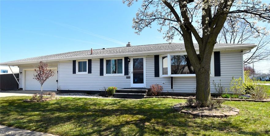 Directly behind Lorain High School of Performing Arts on a peaceful northern Lorain street, very close to Lake Erie sits this welcoming 3 bed ranch. Roof in great shape and updated vinyl siding welcome you. Attached two car garage, plus a well insulated large extra shed which is currently being used as a workshop. Big bay windows. Front living room boasts lovely built-ins and flows to the kitchen. Updated and ADA compliant bathroom. Central A/C. Three beds with hardwood flooring. Waterproofed basement with sump pump and battery backup, and an extra upright freezer that stays. Also on the large lower level is a bonus bed/bath suite ..just awaiting your finishing touches! Fully fenced in very private yard with tons of patio, gardening and entertaining space, a generator that stays, plus a serene Koi pond, which will be professionally serviced for you prior to closing. Newer GREEN upgraded insulation makes home cozy and efficient plus brings an added bonus of creating an ultra quiet atmosphere inside! Seller is generously providing a 1 year home warranty for the Buyer's peace of mind. Please enjoy our attached video tour. Request your private showing today !