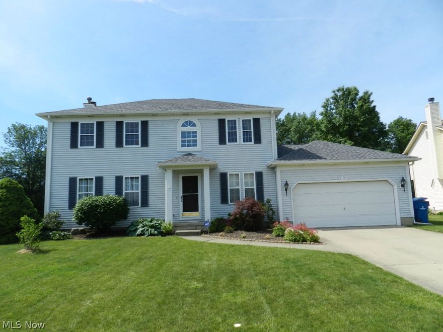 Desirable Home Situated in Desirable Neighborhood with larger lot sizes, newer full fenced back yard w/wooded views and finished basement that includes wet bar/surround sound! Notice the curb appeal of this classic colonial that boast of a large window in 2 story foyer for a light filled entrance, back yard is oversized compared to many newer homes and has a newer privacy fence, raised tiered deck, newer storage shed, etc! Spacious room with kitchen that includes center island w/ample cabinet & counter space.  Open plan includes a family room that boast of a cozy fireplace for those winter evenings. Formal living room or Den also on first floor. Owner's suite has glamour style bath with dual sink and Garden soaking tub. Finished rec room in basement includes a media rm w/surround sound and addition workout room/den/bedroom etc w/wet bar & counter. Great buy in Great Location!!