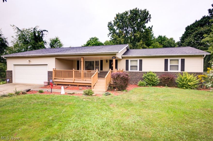 Well maintained and affordable property in Green is waiting for you to call home! This ranch style home offers a 2 car attached garage as well as an additional 1+ car detached garage and is located on over 1/2 acre with fenced backyard.  Whether you are enjoying the peaceful and private surroundings on your large new covered front deck, backyard gazebo or enjoying the wooded views from your enclosed sun porch this is the property you want to come home to! Natural hardwood floors throughout. Formal living room features large picture window, custom antique decorative fireplace and natural wood bookcases. Roomy dining area and kitchen with Amish built cupboards and all appliances, including a new dishwasher and refrigerator. Retreat to the family room with gas fireplace stove and wood beam ceiling that leads to the enclosed sun porch.  Master bedroom with private bath and 2 additional bedrooms with hardwood floors, ample closet space and 2nd full bath. Full basement with updated electric,