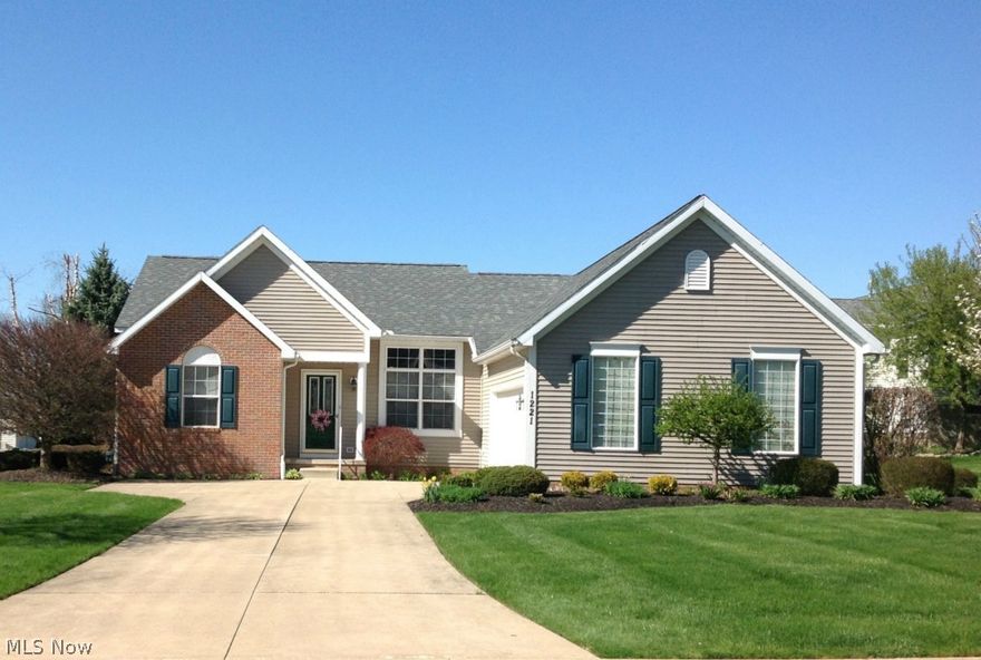 This free standing Stonehedge Villa shows beautifully & has been well maintained & tastefully decorated.  It offers an open/split bedroom floor plan with 3 bedrooms & 2 full baths. There are vaulted ceilings in the great room, dining room & sunroom, gas fireplace in great room, fully applianced kitchen, 1st floor laundry w/built in cabinets, deck off sunroom, full basement & 2 car garage. The many windows provide an abundance of natural light. A $60 monthly HOA fee covers lawn care and snow removal. This villa is conveniently located minutes from shopping, banks, restaurants & the Stark Parks Hoover & Middlebranch Trails offering hiking & biking paths. Call today to see this lovely home!