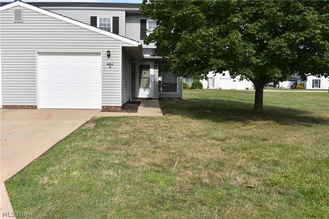 Looking for a condo but still want green space? Need extra parking for your guests? This two bedroom, two full bath Independence Place Condo has both! This unit is one of very few that provide a side yard and extra space visible and accessible from the private patio. Guest parking is close which all that visit will appreciate! On the first level is a spacious living room which is adjacent to the dining room and kitchen. A bonus room in the back can be used as a family room or a third bedroom due to the fact that there is a full bath and large closet making it easy to accommodate your needs. The second level has the second full bath and two bedrooms that have large closets. All appliances including a washer and dryer are included. A home warranty is included. Ownership includes access to the swimming pool, community room and playground. Schedule your visit today!