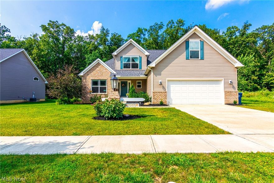 The Perfect Family Home! This custom built 4 bedroom (First Floor Master!), 3.5 bath home has more than 3,800sqft on a wooded lot. The huge finished basement is over 1200sqft and plumbed to host a wet bar. Perfect for entertaining guests, exercising, working in the office, has a half bath and extra room for storage! Enjoy the serenity of the composite deck and paver patio that overlook the wooded backyard, but still leaves plenty of room for the children to play! Vaulted Great Room w/ gas fireplace. Granite counters in bathrooms and kitchen. The kitchen also has stainless steal appliances, pantry cabinet has slow closed pull out shelving. Master bedroom is vaulted w/ crown molding. The attached 2 car garage has a large bonus room above, along with Rubbermaid fast track units and shelving. An added second utility sink. The community center has an indoor pool, conference room, community area, tennis courts and basketball courts.  A family friendly neighborhood with plenty of amenities fo