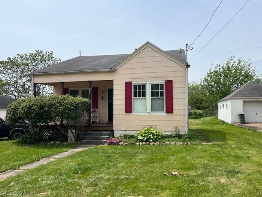 Cozy Sears Roebuck Cottage, 2 bedrooms, 1 bath, minutes from town. Enjoy a quiet front porch on a dead end street. One car detached garage, full basement, upgraded electric service, level lot with grape arbor. Perfect spot for a garden out your back door!