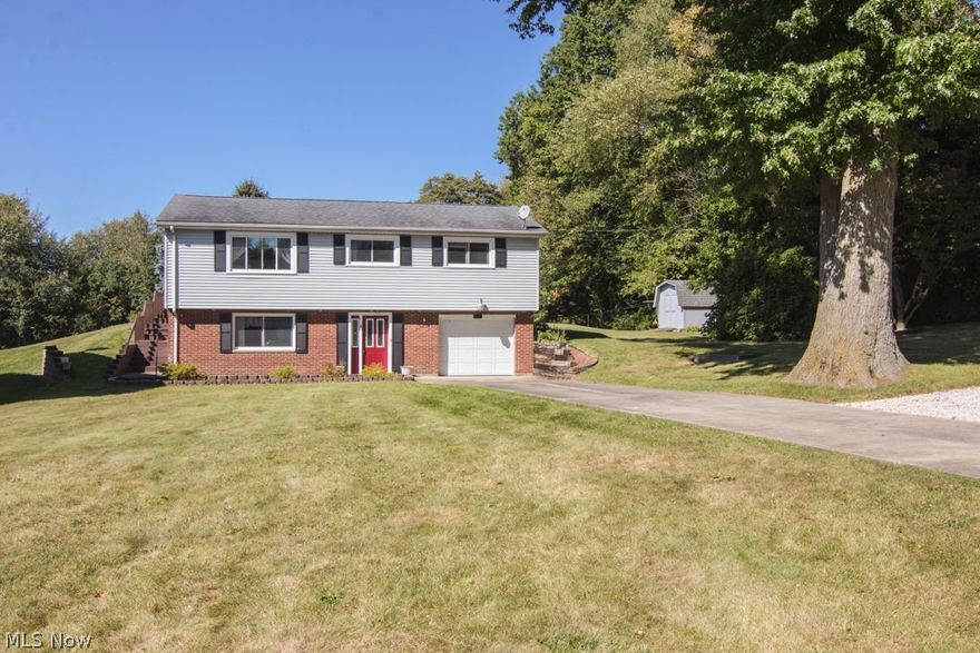 Welcome to 4525 Coe Road in Ravenna. This 1664 sq. ft. Bi-level home features 3 bedrooms, 1 1/2 bathrooms, an eat-in kitchen and spacious living room.  The home also features a large family room/recreation room with bar in the lower level, a deep 1 car attached garage, nice size wood deck that overlooks the serene backyard, and a storage shed on a 0.84 of an acre city lot.  If you're looking for a partially wooded lot in the city with city utilities this is for you!