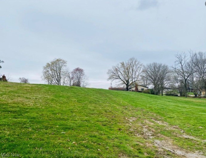 Cleared lot ready to build on. City lot with approximately half an acre. Survey will be completed by seller. All utilities available at road. 2nd lot (listed seperately) available for purchase as well. (MLS # 4477842)