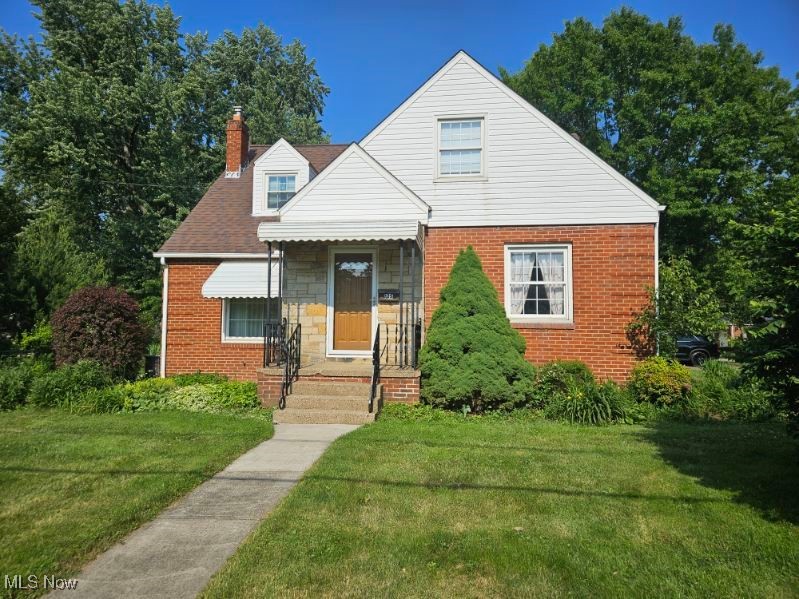 You will feel right at home when you step inside 125 Canton Rd.! This cape style house just "feels like home". If you need space this is a great opportunity! Featuring 4 bedrooms and 2 full baths this home has so much to offer! On the main floor there is a very nice size kitchen w/eating area loaded with lots of cabinet space and counter space, cozy living room w/fireplace, 2 bdrms and 1 full bath. The 2nd floor offers 2 larger bedrooms and a 2nd full bath that features double sinks! The lower level is nicely finished with a rec room/family room area and it leads into the other side finished with a wet bar all accented with beautiful knotty pine! This would make a great cave area to simply enjoy or added space for entertaining! This home is larger than it looks! This corner lot is oversized with a side yard, perennials planted throughout and a private patio area tucked between the house and the detached 2 car garage which you will access from the side street (Eastgate Ave.). Close to schools, shopping, eateries, library, expressway access and bus line. Don't wait to schedule your private showing! This spacious well maintained home is sure to go fast!