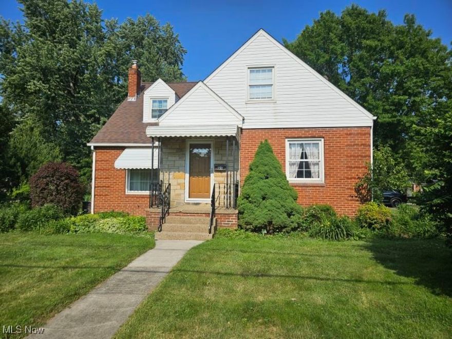 You will feel right at home when you step inside 125 Canton Rd.!  This cape style house just "feels like home".  If you need space this is a great opportunity!  Featuring 4 bedrooms and 2 full baths this home has so much to offer!  On the main floor there is a very nice size kitchen w/eating area loaded with lots of cabinet space and counter space,  cozy living room w/fireplace, 2 bdrms and 1 full bath.  The 2nd floor offers 2 larger bedrooms and a 2nd full bath that features double sinks!  The lower level is nicely finished with a rec room/family room area and it leads into the other side finished with a wet bar all accented with beautiful knotty pine!  This would make a great cave area to simply enjoy or added space for entertaining!  This home is larger than it looks!  This corner lot is oversized with a side yard, perennials planted throughout and a private patio area tucked between the house and the detached 2 car garage which you will access from the side street (Eastgate Ave.).  Close to schools, shopping, eateries, library, expressway access and bus line. Don't wait to schedule your private showing!  This spacious well maintained home is sure to go fast!