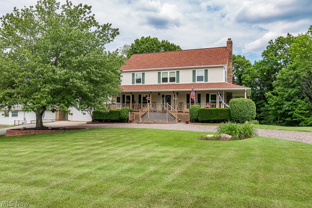 Sunshine and summertime! Soak up both in this four bedroom three full bath home situated on a beautiful parcel of land in a fantastic community. This home features an incredible wrap around porch with a portion screened in to enjoy summer evenings. When you enter the home, there is a spacious foyer and the home has a natural flow. There is a large living room leading into a fantastic updated eat-in kitchen. The renovated kitchen has Merillat cabinets, granite counters, and induction cooktop as well as double wall ovens. There is a formal dining room that can double as an office or den. The main floor also has a full bath and laundry/mud room. The two+ car attached garage has both a workshop area and additional storage space above that. Upstairs, the large master suite has a walk-in closet, glamorous soaking bath with chandelier above and walk-in shower. The double vanity has much storage. The three additional bedrooms are a great size and share another full bath. The basement offers to
