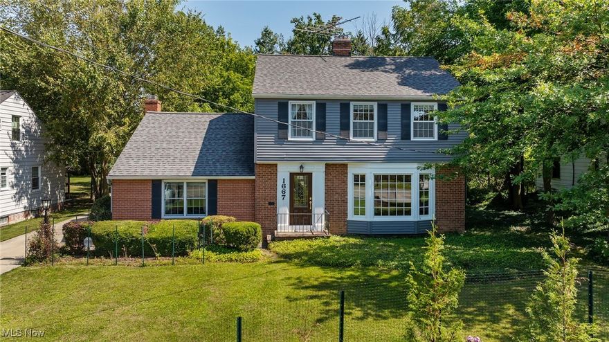 Welcome to this beautifully manicured Center Hall Colonial, where timeless 1941 charm meets modern convenience and stunning updates. Rich original wood floors, classic moldings, and a traditional layout with built-ins in the dining room and primary bedroom, reflect the home's historic character. The updated kitchen features a charming breakfast nook, perfect for morning coffee or casual meals. The "mud room" is lined with storage cabinets galore keeping your everyday items close at hand but tucked away. The exquisite dining room with a stunning chandelier, original hard wood floors and built-ins will make any meal special!  A spacious family room addition offers the ideal setting for gatherings by the fireplace with a gas starter or just a quiet night at home.  The impeccably maintained interiors are complemented by three fireplaces, 2 full and one half bath, stunning built-ins with lighting in dining room and the primary bedroom, 2023 central air, 2023 marvin living room windows, and a 2024 ProVia front door, (see supplements for full list of updates), Bosch dishwasher 2020,  Kitchen Aid Halogen cooktop, Maytag wall oven, Samsung Refrigerator 2017,and Pella Architect slider opens to the double deep lot in the backyard off of the great room. Enjoy a backyard retreat lined by mature trees enabling the privacy you yearn for and a half finished basement with a versatile bonus room with a wet-bar and a fireplace. All appliances stay, one year home warranty offered by sellers. This true gem of a home blends elegance, comfort, and functionality with enough room for home offices and entertaining.