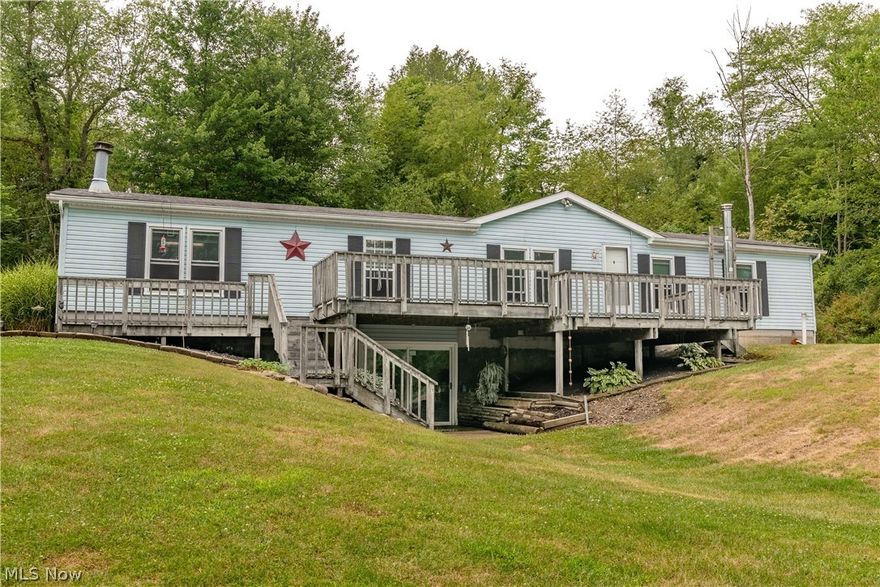 Welcome to your serene retreat nestled on 5 acres of picturesque land! This charming modular home boasts 1768 square feet of comfortable living space, highlighted by a cozy wood-burning fireplace in the living room and an additional wood burner in the basement for those chilly evenings.

Enjoy the convenience of a walk-out basement leading to your expansive backyard, perfect for outdoor gatherings or simply taking in the peaceful views of the surrounding woods. The master bedroom features a full bathroom and a spacious walk-in closet, offering a private sanctuary within your home. A second bedroom with two closets and a third bedroom provides ample storage space.

Recent upgrades include all new duct work and windows, ensuring efficiency and comfort year-round. The basement is fully waterproofed with a lifetime warranty, adding peace of mind to your investment.

Whether you're seeking tranquility, space to roam, or a cozy spot by the fire, this property offers it all. Schedule your tour today and envision your new life in this idyllic setting!