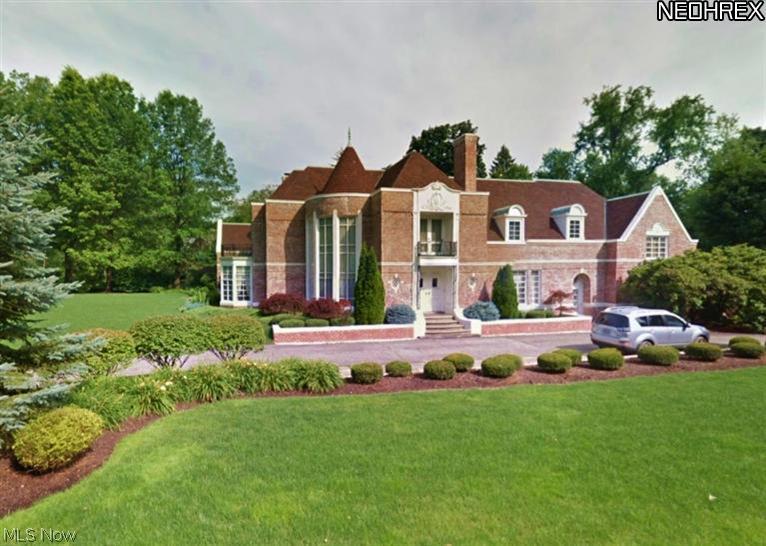 Phenomenal French Normandy Estate designed by Roy Firestone. Almost 6,000 square ft of quality construction. Dramatic foyer entry with a curved staircase in the 2 story turret. Beautiful marble floors. Gracious formal dining and large formal living room with fireplace, organ room and pipe organ built into one wall. Gorgeous cathedral family room with rich wood walls, massive wood ceiling trusses and 2 additional rooms on each end for office or den. Big bright kitchen includes an informal eating area fireplaced family room. 2 of 4 fireplaces imported from France. Enclosed porch overlooking the large private lot. Front and back staircases lead to 5 bedrooms and 4 full baths. Fabulous his and hers master suites with dressing rooms and private baths. Fourth fireplace in master bedroom. New windows in 2012. Whole house fan. Insta-Hot water. Furnace checked and serviced 2013. Underground sprinkler. 3 car garage and so much more. Beautifully maintained. Must see!