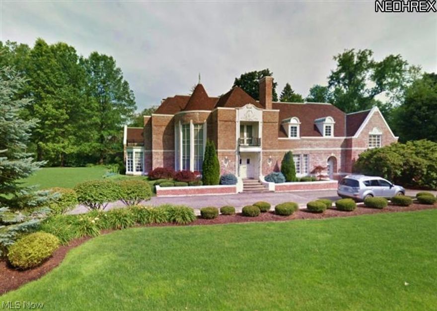 Phenomenal French Normandy Estate designed by Roy Firestone.  Almost 6,000 square ft of quality construction. Dramatic foyer entry with a curved staircase in the 2 story turret. Beautiful marble floors. Gracious formal dining and large formal living room with fireplace, organ room and pipe organ built into one wall. Gorgeous cathedral family room with rich wood walls, massive wood ceiling trusses and 2 additional rooms on each end for office or den. Big bright kitchen includes an informal eating area fireplaced family room. 2 of 4 fireplaces imported from France. Enclosed porch overlooking the large private lot. Front and back staircases lead to 5 bedrooms and 4 full baths. Fabulous his and hers master suites with dressing rooms and private baths. Fourth fireplace in master bedroom. New windows in 2012. Whole house fan. Insta-Hot water. Furnace checked and serviced 2013. Underground sprinkler. 3 car garage and so much more. Beautifully maintained.  Must see!