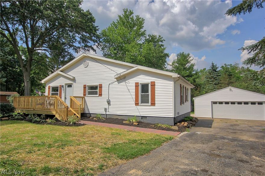 This absolutely adorable home has been COMPLETELY UPDATED!! When arriving at this charming home you will be greeted by *All new siding* New Windows *New shutters *New spacious front deck. Once entering the home you will find *New vinyl plank floors that spreads throughout that open floor plan from the living room to the kitchen. This gorgeous kitchen offers *New Cabinets *New light fixtures* New Butcher block countertops *New Stainless steel Oven & Dishwasher. Through the kitchen stepping down to the gorgeous sunroom that is lined with shiplap walls, large windows, beautiful fireplace and door exiting to a large, private backyard! The backyard features a patio, extra large two car garage, shed and charming creek. *Updated Bathroom includes *New vanity,*new light fixtures, New tub * New Flooring. Other updates include  ***New A/C** New furnace**New Carpet**New Paint**New Septic**Home is located in a great location~minutes to Target shopping center, local restaurants/shopping. Minutes fr