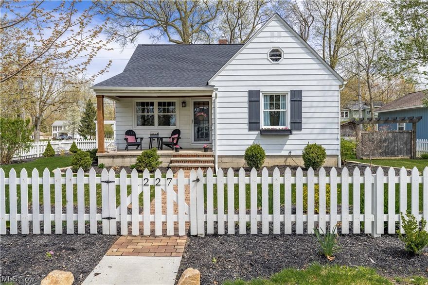 Move right into the fully updated 3 bedroom Cape Cod home, just bring your furniture. The front of the home has so much curb appeal with beautiful landscaping and cute front porch to enjoy. Opening the front door leads into a large living room with newer flooring. The eat in kitchen has plenty of space with cabinets and open shelving, stainless steel appliances, farmhouse sink, subway tile backsplash, newer flooring and lighting. The french doors lead to a breezeway/sunroom to a 1 car garage. The 1st floor has a master bedroom and 2nd bedroom both with newer flooring. The full bathroom is completely updated. A large bedroom on the 2nd floor with extra storage space. The extra wide driveway is newer with a basketball hoop. The yard is fully fenced in and has a privacy fence and fire pit area. A list of updates and when completed are available. Schedule your private showing today, this home won't last.