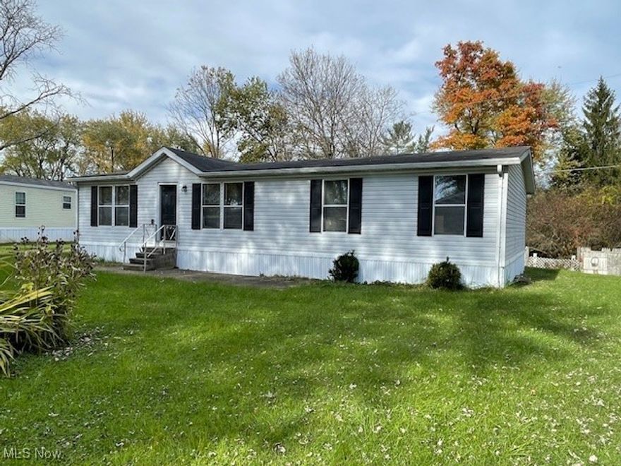 Spacious 3 bedroom double-wide ranch located walking distance from Maysville Schools, offering 2 full bathroom, living room, family room, laundry room, open kitchen & dining room. Kitchen has plenty of cabinets and an extra counter with additional cabinets, perfect for hosting holiday gatherings. This home is priced to sell!!! Lot rent is $495/mo (includes trash & snow removal), sewer $50/mo. Owner pays water & electric. Buyer must be approved by property management company prior to purchase (application online at Greenlawn Estates).