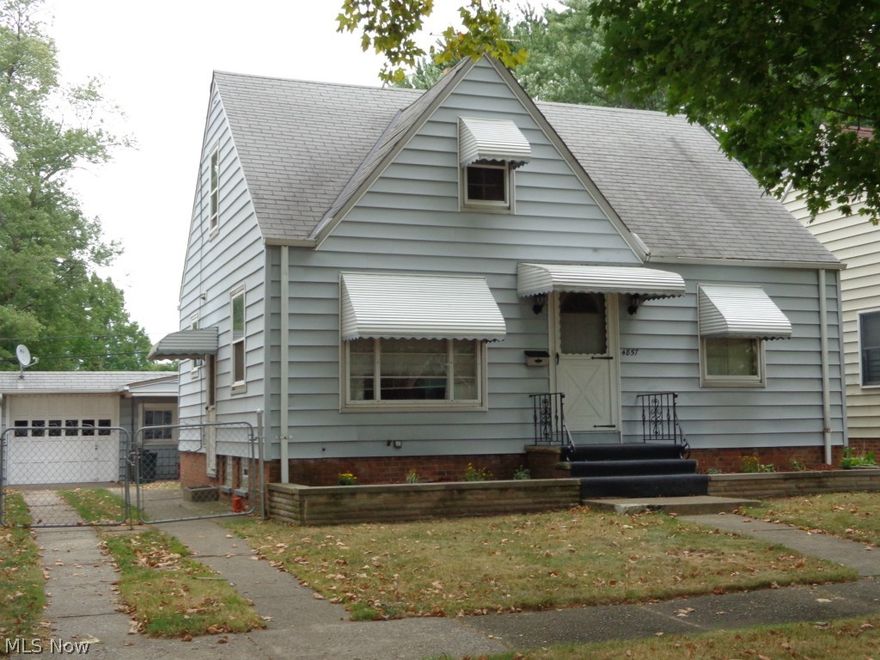 Priced to Sell!Old Brooklyn charm, this cape cod has a full bath, eat-in kitchen with appliances, living room and two bedrooms on the 1st floor with hardwood flooring; one large bedroom upstairs with built-in chest and drawers and nice size closet,private fenced backyard with covered patio, living room with hard wood flooring, Roof is approximately 20 years, furnace with Aprilaire and C/A are approximately 10 yrs yg, hot water tank 2/2014, finished rec room with carpeting, unique faux brick wall and lots of built-in storage, great location minutes from I-480, downtown Akron and Cleveland, minutes from shopping, schools and RTA.