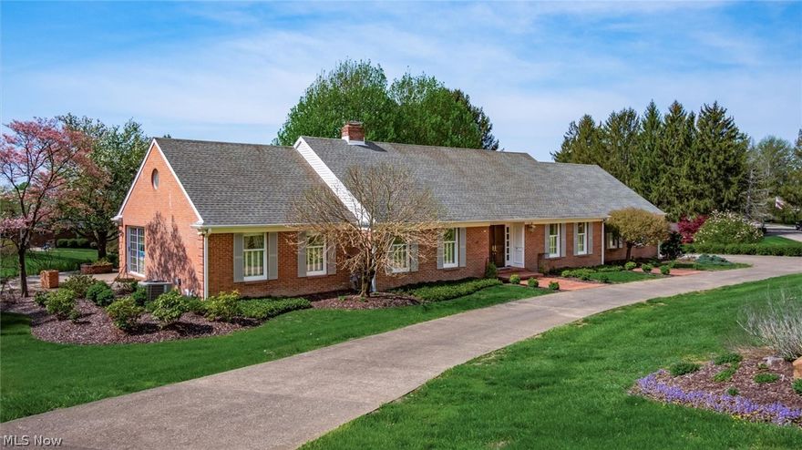 Custom-built brick Cape Cod set on a beautifully landscaped lot with a circular drive and an inviting brick patio terrace—perfect for outdoor entertaining and quiet evenings alike. This one-and-a-half-story residence blends timeless design with thoughtful craftsmanship, offered for the first time.
Step into an impressive open foyer highlighted by a sweeping circular staircase, setting the tone for the home’s character and elegance. The spacious first-floor master suite provides a private retreat, complete with a sitting area ideal for relaxation.
The classic kitchen is fully appliance and showcases a distinctive tile floor and handcrafted tile backsplash, offering both charm and functionality. A first-floor laundry room adds everyday convenience, while the formal dining room is well-suited for hosting gatherings.
Both the formal living room and family room feature fireplaces, creating warm, inviting spaces to unwind. Expansive windows throughout the home capture natural light and offer picturesque views of the surrounding landscape.
The home includes four bedrooms, three full baths, and two half baths, along with an additional finished living area in the basement—perfect for recreation, media, or extended living needs.
A 28' x 28' workshop provides exceptional space for hobbies or storage, complemented by an attached two-car garage. Rich wood flooring runs throughout much of the home, enhancing its warmth and timeless appeal.
A rare opportunity to own a thoughtfully designed, custom home in a beautiful setting—truly a must-see.