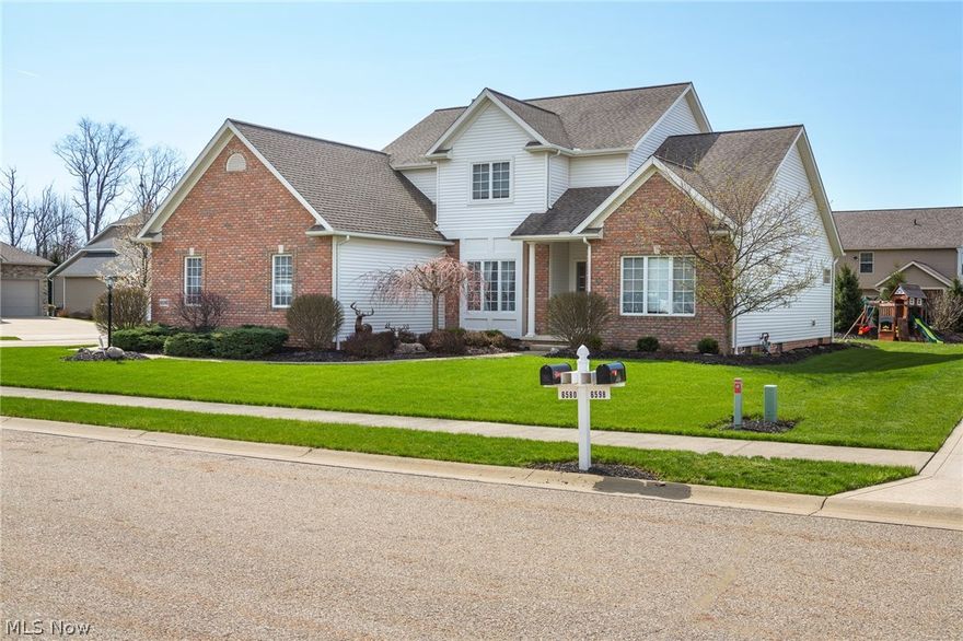 Welcome home to 6580 Donelson Cir NW in Aberdeen Ridge! Entertain your guests from this dream kitchen with SS appliances, a center island and coffee bar area which flows easily into the great room which boasts a stunning gas fireplace or move easily into the window filled dining room. The private first floor master suite has double closets, a walk-in closet and the bath has his & her sink areas with a corner garden tub! First floor laundry and a 1/2 bath round out the 1st floor. The upstairs has 3 very generous bedrooms and ample closet space along with a full bath. The custom lower level has an additional 1,084 sq ft of open concept living space. The custom bar area has just been completed with fantastic use of reclaimed wood. A beautiful 1/2 bath , office and huge storage area round out this level. This 3 car garage home all on a very well maintained corner lot can be yours today!