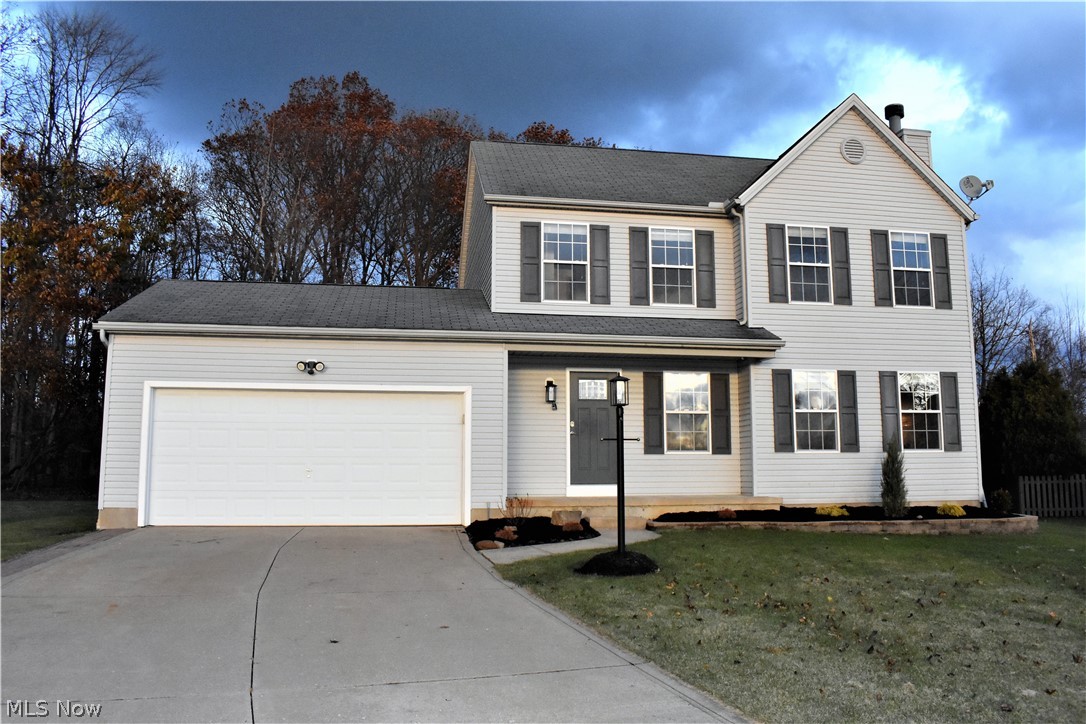 The Heart of this home is the Modern Kitchen featuring Brand New Stainless Steel Appliances, full height upper cabinets, integrated pantry, granite countertops with undermount basin sink and Moen faucet. The First floor has a spacious layout with eat-in kitchen, laundry, half bath, family room with gas fireplace, and new Luxury Vinyl Flooring throughout. The Huge Primary Suite upstairs features vaulted ceilings, walk-in closets, a private bath with dual sink vanity, soaker tub, full shower and new flooring. Below grade, the full, open basement has the potential of being bonus living space or just lots of extra play area and storage. The furnace and central air are less than a year old. The heated garage has electric, water and attic space. Perhaps the best quality of this home is its location, being situated on an oversized keystone lot on a semi-cul-de-sac. The outside has one of the longest driveways in the neighborhood, direct access to a forest in the backyard, 290 square fo