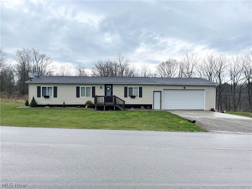 Embrace the serenity of living outside of town in this Bowerston home. This 3 bed, 2 bath home, situated on 1.16 acres is your peaceful living dream! All 3 bedrooms are large with spacious closets. Step onto the back deck to soak up nature's beauty and take in the view of your large backyard. Enjoy the convenience of an attached 2-car garage and an insulated shed for extra storage. This home has undergone many updates including laminate flooring, all new carpet in 2023, and an inviting eat-in kitchen. You'll love the first floor laundry and efficiency of an all-electric home. Located just 15 minutes from Tappan Lake, every day feels like a retreat.
All appliances are included, along with furniture and TV if desired.
Make your move to tranquility today!