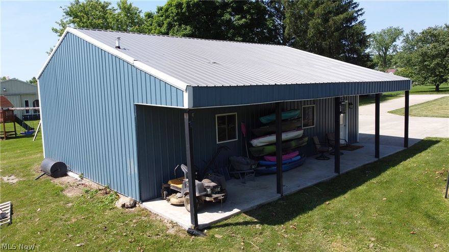 Welcome to your dream home! This stunning three -bedroom, three -bathroom residence is a perfect blend of comfort and luxury. Nestled on a beautiful flat yard with no close neighbors, it offers unparalleled privacy and tranquility. Step inside to discover a semi open floor plan featuring an  eat-in kitchen, complete with ample counter space, perfect for both everyday meals and entertaining guests. Adjacent to the kitchen, a large deck with vaulted ceilings invites you to enjoy outdoor dining and relaxation while overlooking your serene surroundings. The finished basement adds versatile living space, ideal for a family room, home office, or recreational area. Car enthusiasts and hobbyists will be thrilled with the detached 40 x 40 (including lean-to) garage, offering plenty of room for vehicles, tools, and storage. Additionally, the attached two-car garage provides convenient access to the home. This property truly has it all – an amazing setting, spacious living areas, and exceptional amenities. Don’t miss the opportunity to make this beautiful house your new home! Schedule a showing today and experience it for yourself.