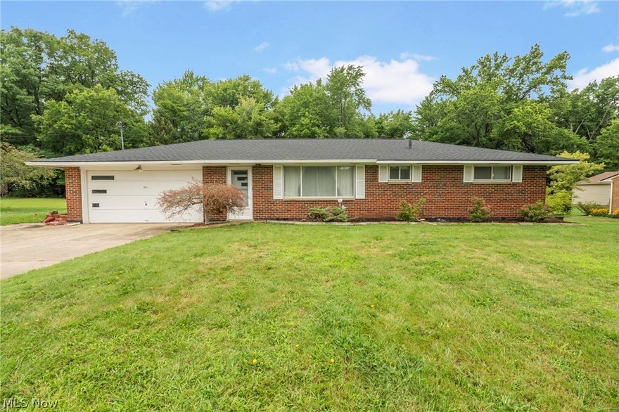 Welcome home! One level living! This meticulously maintained brick ranch has a brand new roof and curb appeal. Large additional living room addition provides plenty of additional living space with floor to ceiling windows and a fireplace. Spacious kitchen with cabinet space galore, formal living area with brand new window and tons of light. The primary bedroom boasts a private half bath! Back yard has a nice sized concrete patio and wooded view. Brand new roof!