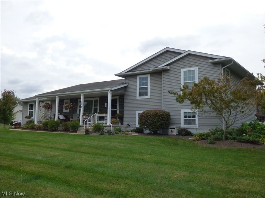 Custom built, one owner, 3-4 bedroom home in Parkside Reserve.  Large country kitchen with custom built maple cabinets and quartz countertops.  Well landscaped yard with many plants, shrubbery and peach tree.  Relax on your deck or patio and enjoy nature.   Features two and a half baths, FR with fireplace, utility room, oversized garage, extra wide driveway and shed.  May enter basement from inside house and from garage.  Kitchen, hall and Living room have LVP (Luxury Vinyl Plank) flooring.  Close to Findley State Park and Wellington Reservation.  Ready for you to move in and enjoy this lovely home and the many amenities that the Village of Wellington has to offer.