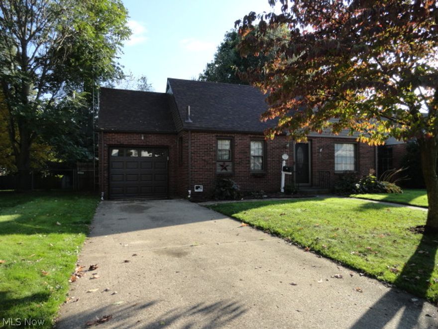 Beautiful new kitchen, updated bath and huge stamped concrete patio & fenced-in back yard.  Cozy fireplace in living room. New water heater 2013, furnace & air 2005, water softener 2009, front door and garage door 2012, and new plumbing 2009.  Convenient location to Monument Park walking trail, I-77 &  Rt. 62. Nice!