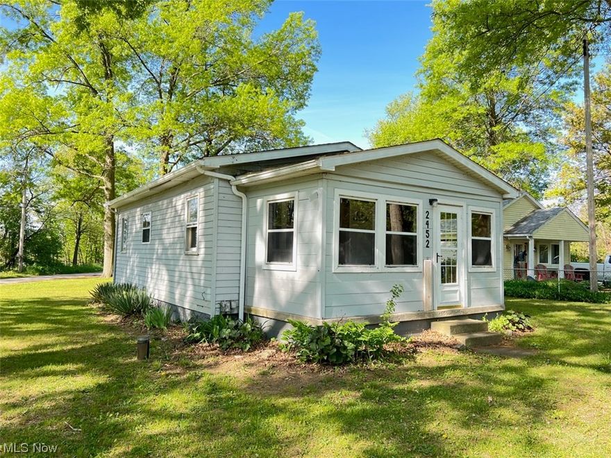 Tiny houses are very popular right now. This is your chance to own one in the city with a country feel. Definitely off the beaten path. There's room to build on to the house and even add a garage due to the corner lot location. This house is in excellent condition with remodeled galley kitchen and newer furnace and hot water tank. Enclosed front porch is the "other" room. Laundry hookups in the bathroom.