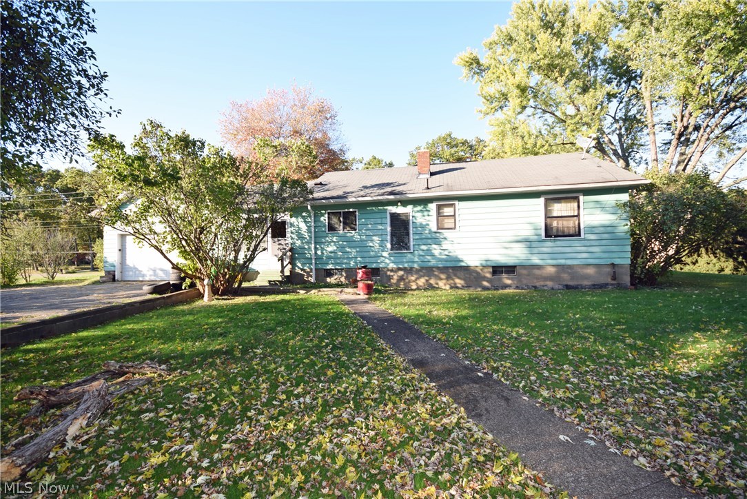 Look at this great opportunity! 2 Bdrm, 1 BA home on a private rolling lot. Over 2 acres with Green Local Schools! 2 car attached garage! This one will need some cosmetic updates but the setting is beautiful! Call today to schedule you personal showing! It won't be on the market long, priced to sell!